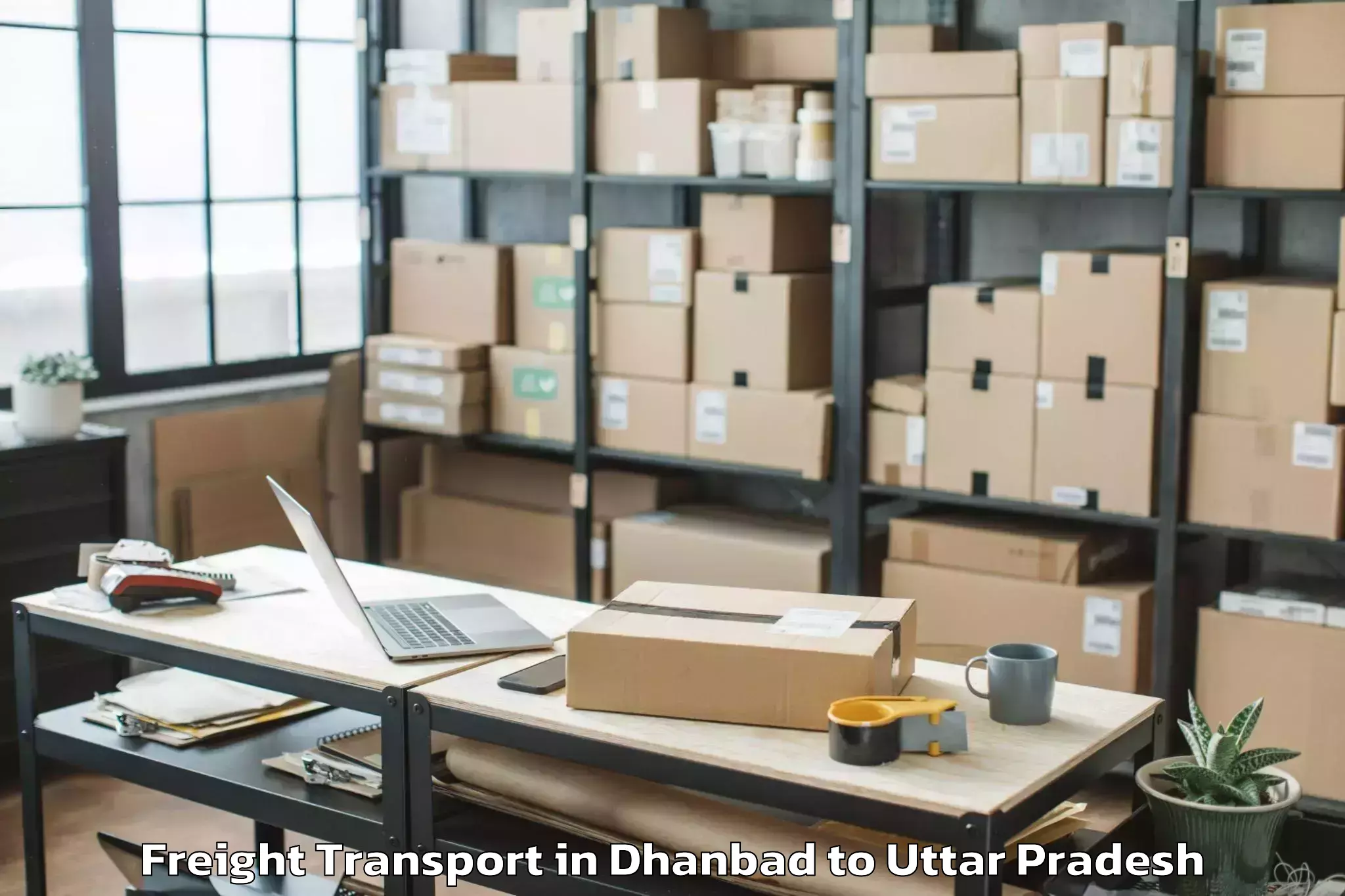 Easy Dhanbad to Maniar Freight Transport Booking